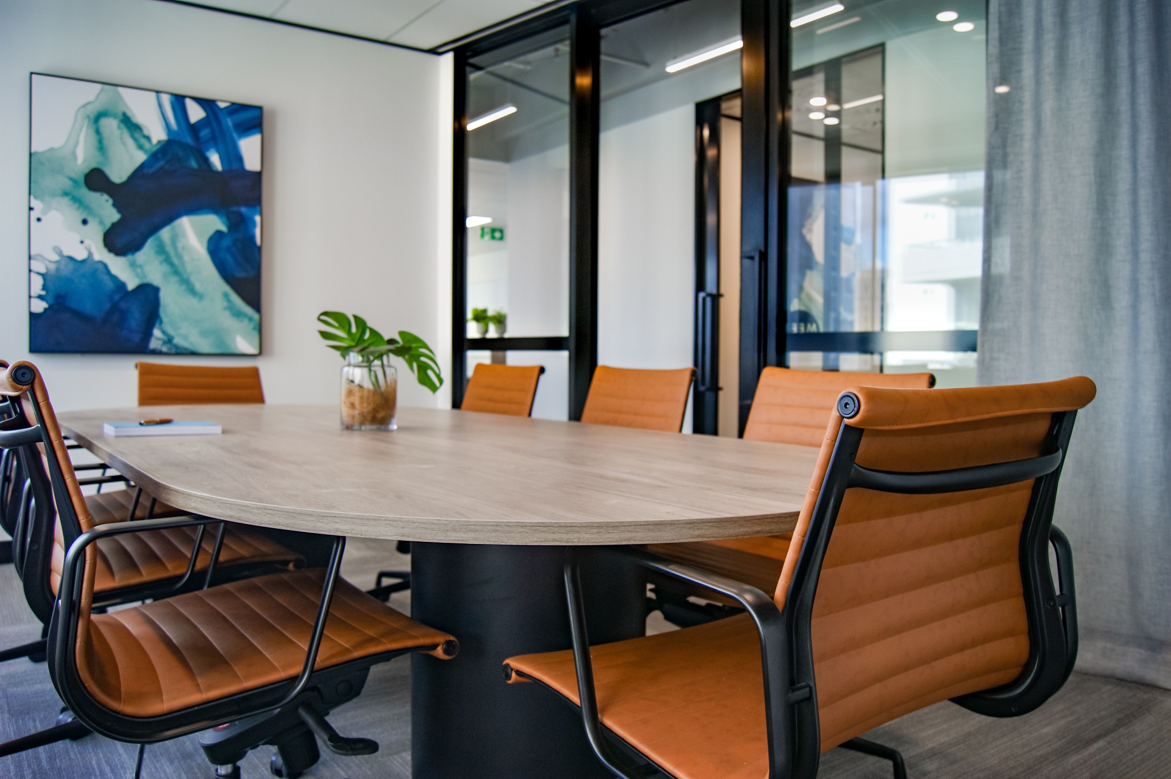 A picture of a conference room in a shared office space building.